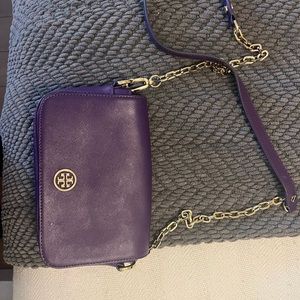 Lightly used purple Robinson Tory Burch cross body, gold metal